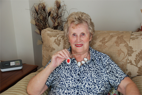 Elderly lady wearing her MyAmie Pendant