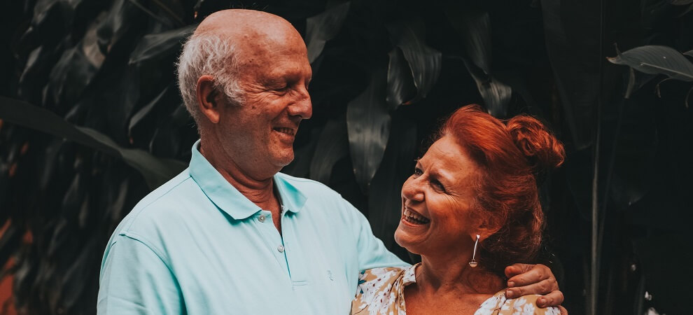 elderly couple smiling together