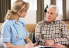 Nurse with elderly man